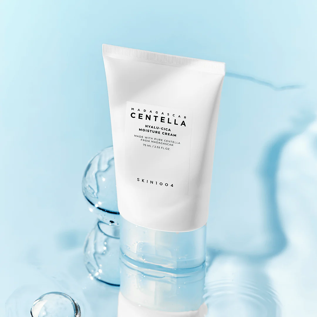 Skincare tube labeled 'Madagascan Centella' on a light blue background