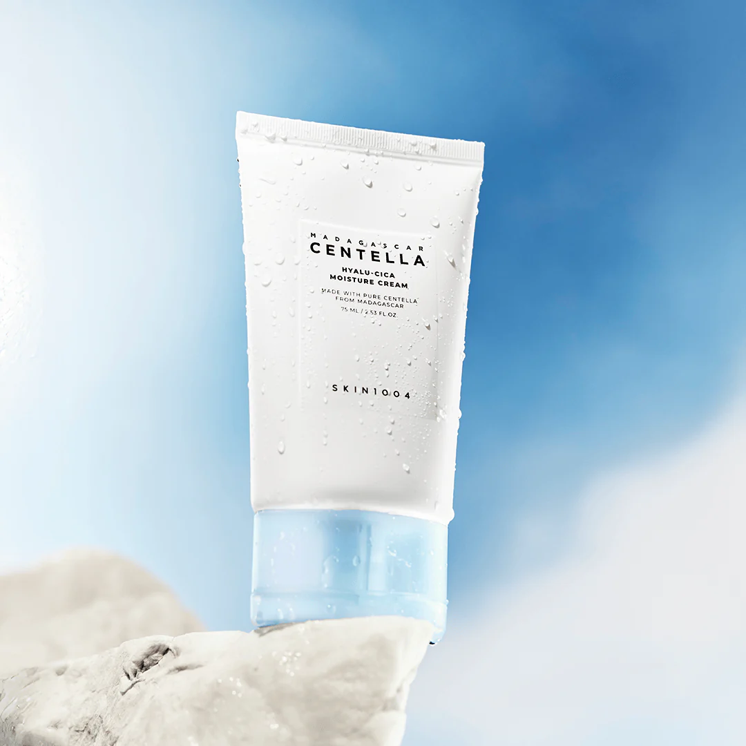 Cenella cream tube with a blue sky and clouds in the background