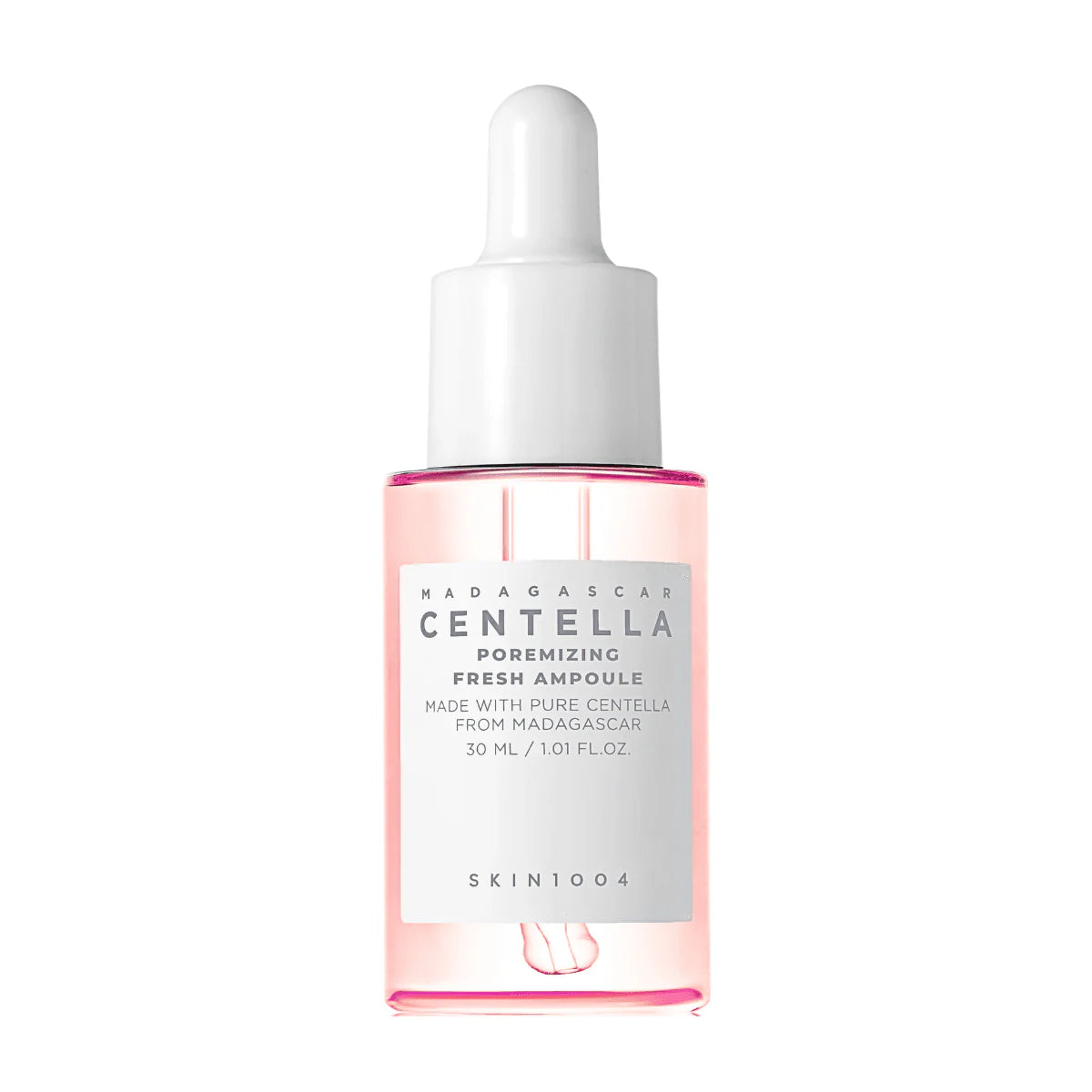 Skincare ampoule bottle with pink liquid and white cap on a white background