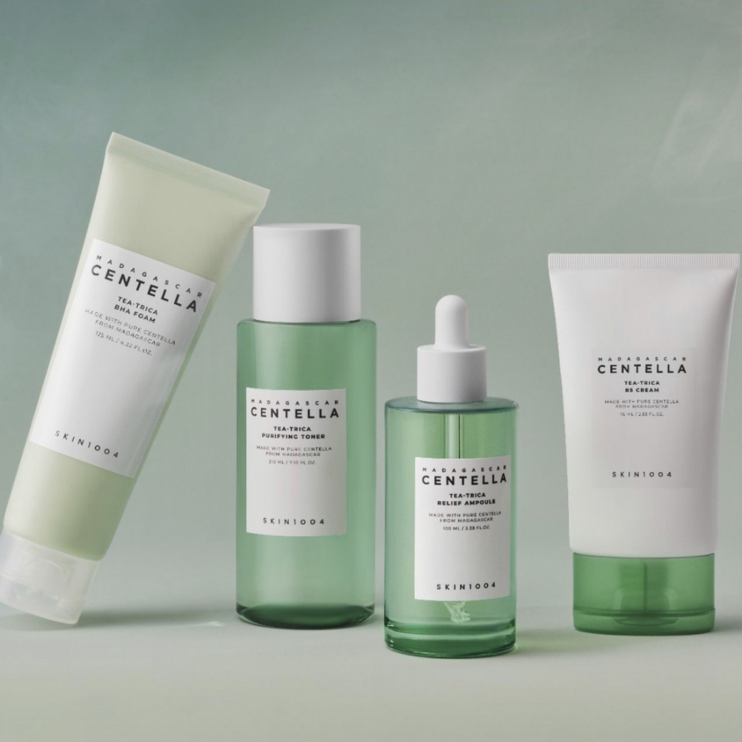 Set of skincare products with Centella Asiatica on a light green background