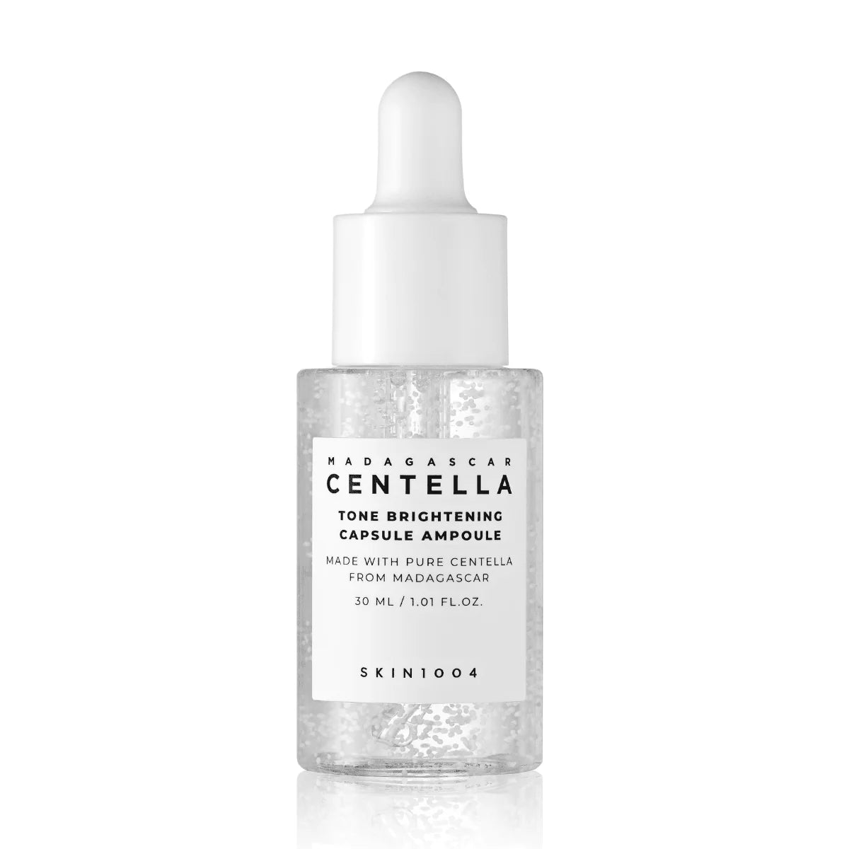 Skincare bottle with dropper labeled 'Madagascar Centella' on a white background