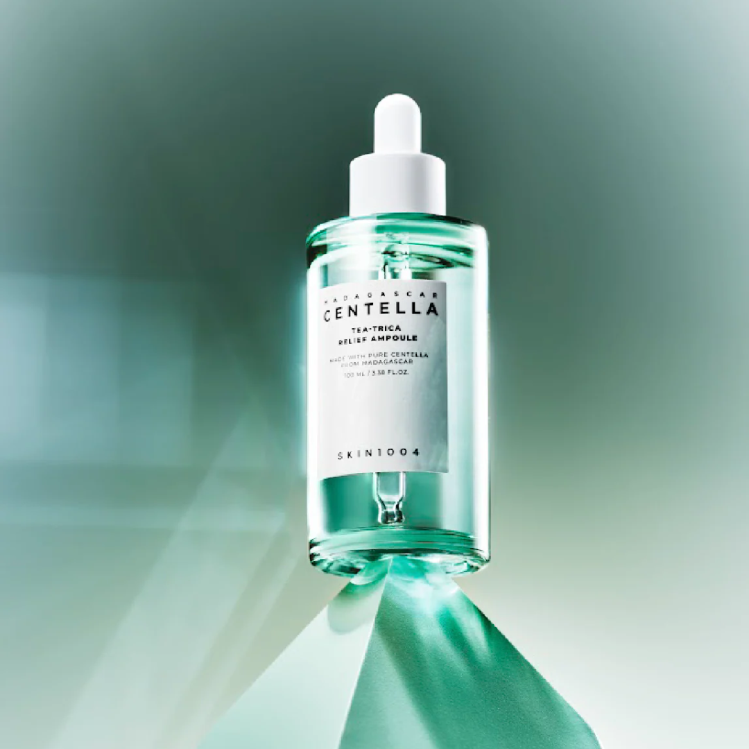 Skincare bottle with dropper on a gradient green background