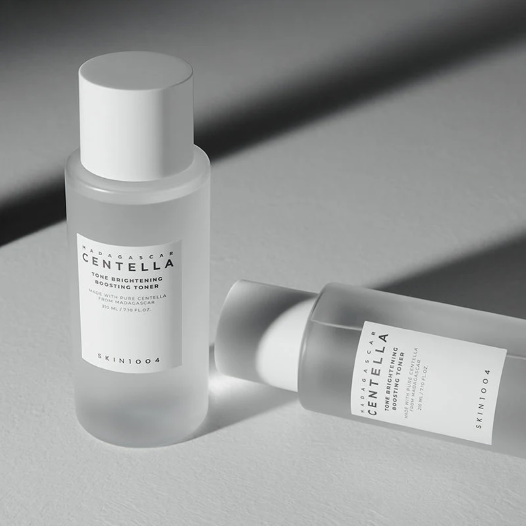 Two bottles of Skinceuticals Centella Pure Brightening Toning Water on a gray background