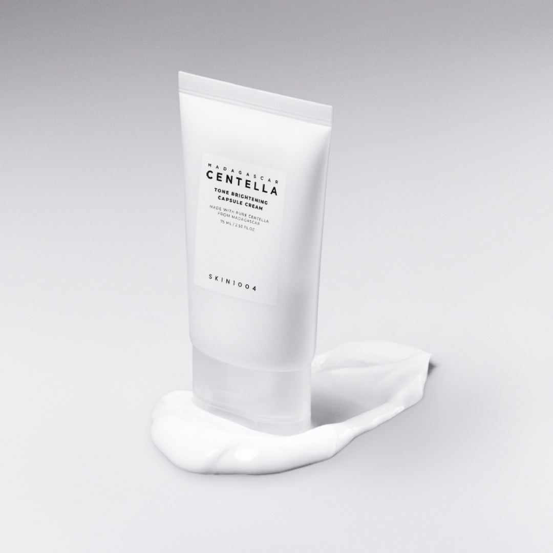 Skincare cream tube with visible brand name on a gray background