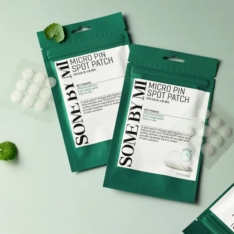 Two packages of 'SOME BY MI' micro pin spot patches on a light green background.