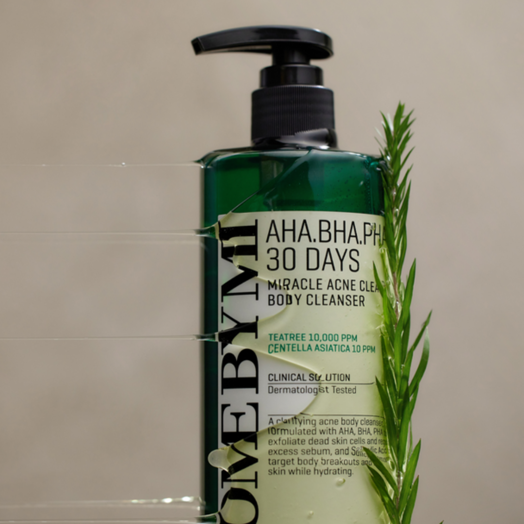 Green bottle of 'Love by M' body cleanser with a pump on a beige background