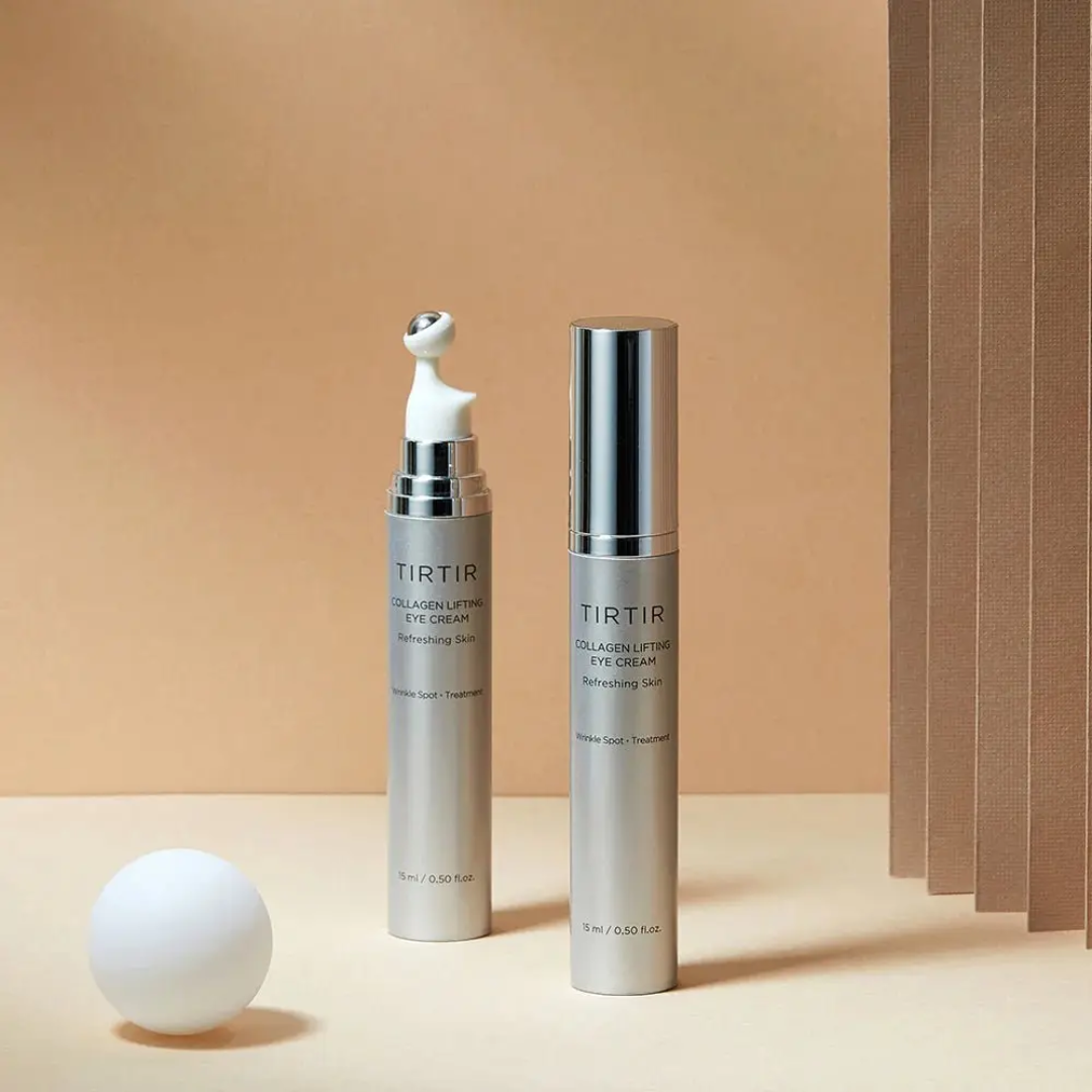 Two TIRTIR eye cream bottles on a beige background
