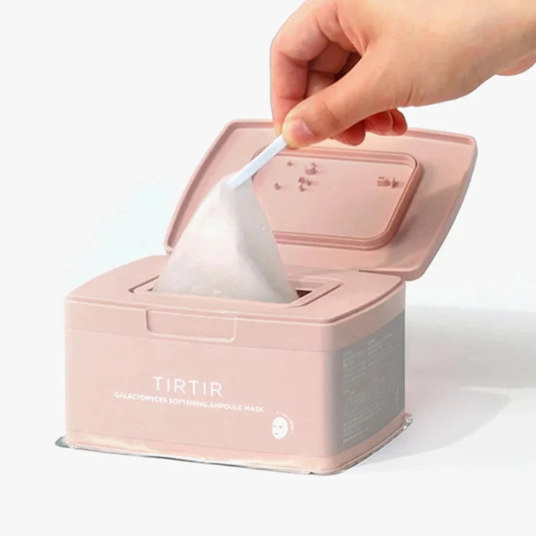 Pink TIRTIR tissue box with a hand taking out a tissue