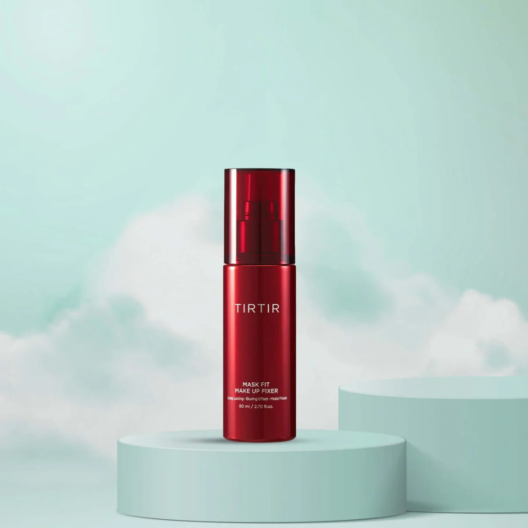 Red skincare bottle labeled 'TIRTIR' on a light green platform with a light blue background