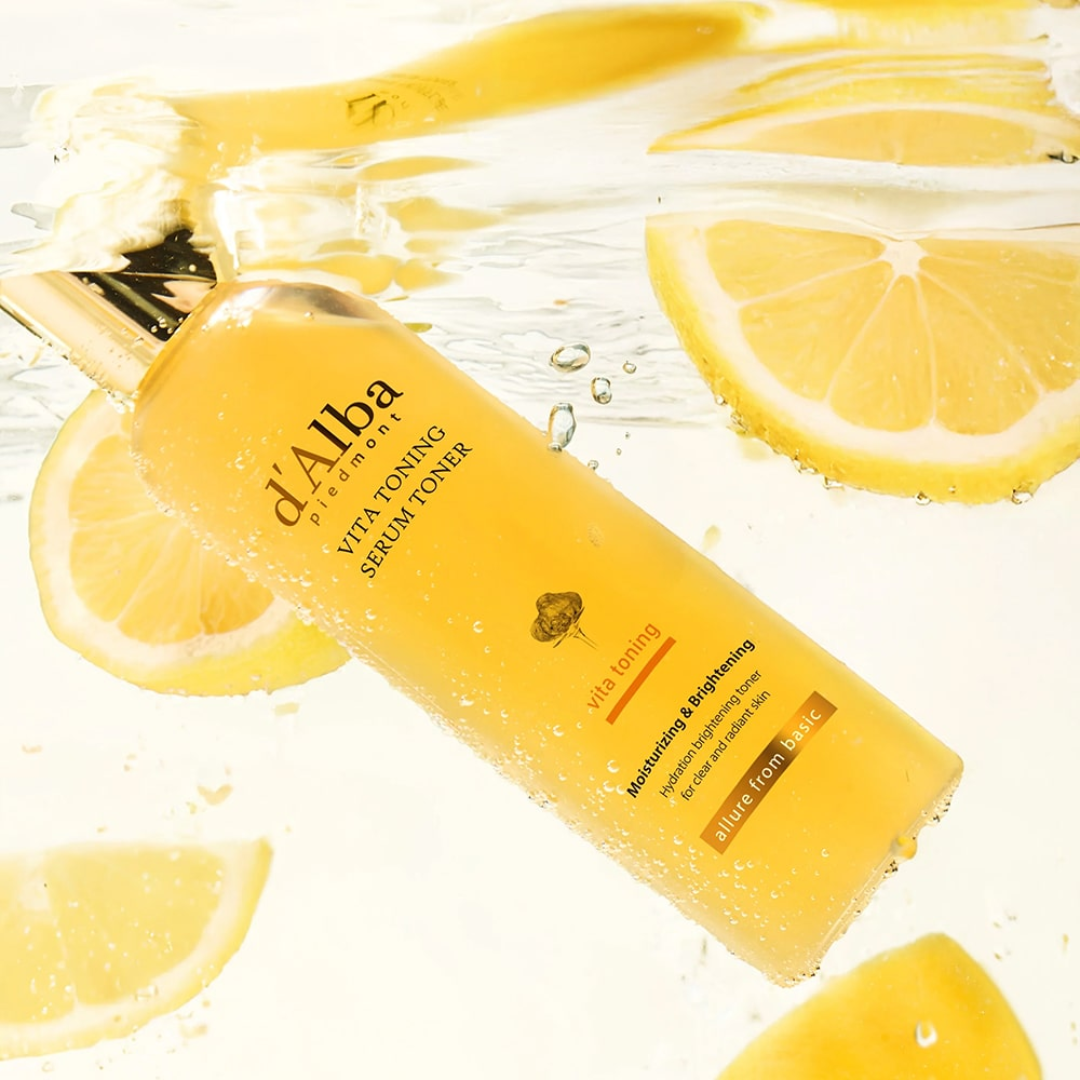 DAlba skincare serum toner bottle with lemon slices on a light background