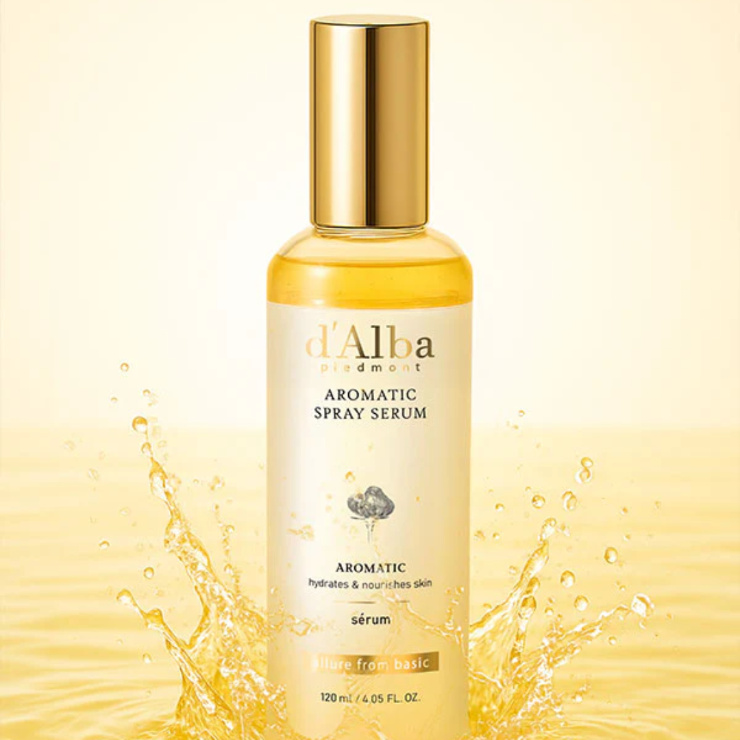 L'Alba Aromatic Spray Serum bottle with gold cap on a yellow background