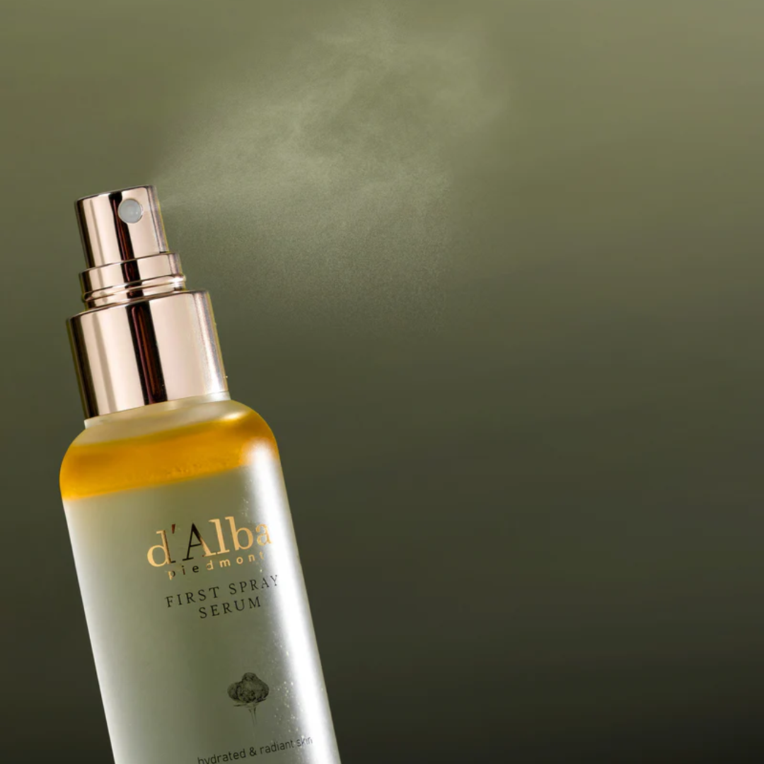 d'Alba serum bottle with gold cap on a green background
