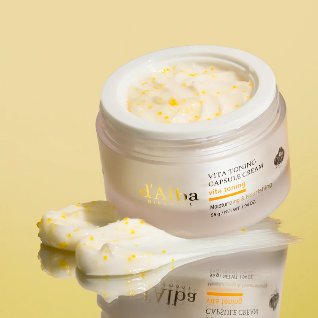 Jar of d'Alba Vita Toning Capsule Cream on a yellow background